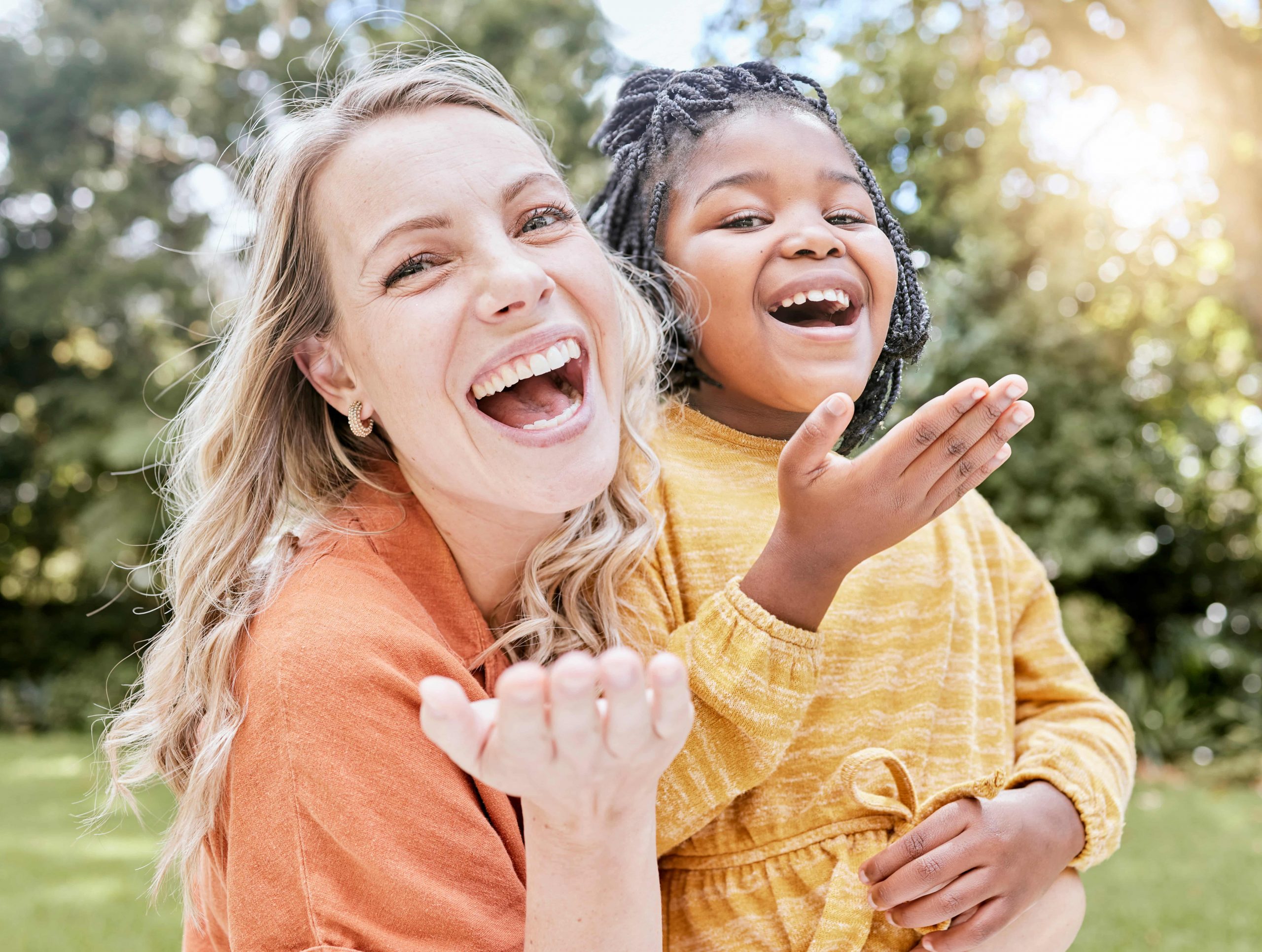 Adoption, mother and girl outdoor, smile or happy being loving, bonding or happy together. Portrait, adopted child or black girl with foster mother, happiness or love for care, relax and quality time.